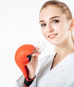 woman sports mouthguard