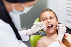Young girl at dentist