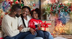 family opening presents during the holidays