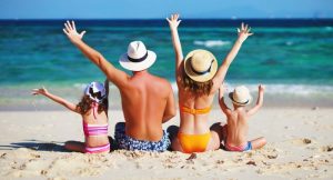 excited family on the beach