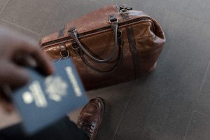 Man with passport and luggage