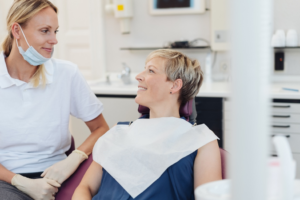 a dentist and patient chatting 