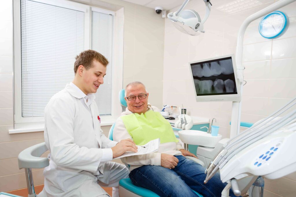 Man smiling at the dentist