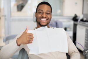Man smiling at his dental checkup